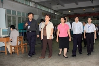 自治区副主席李康在区教育厅厅长高枫、副市长文和群陪同下到我院视察