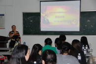 贸旅学院举行“重温誓词、学习党章、互称同志、佩戴党徽”主题党日活动